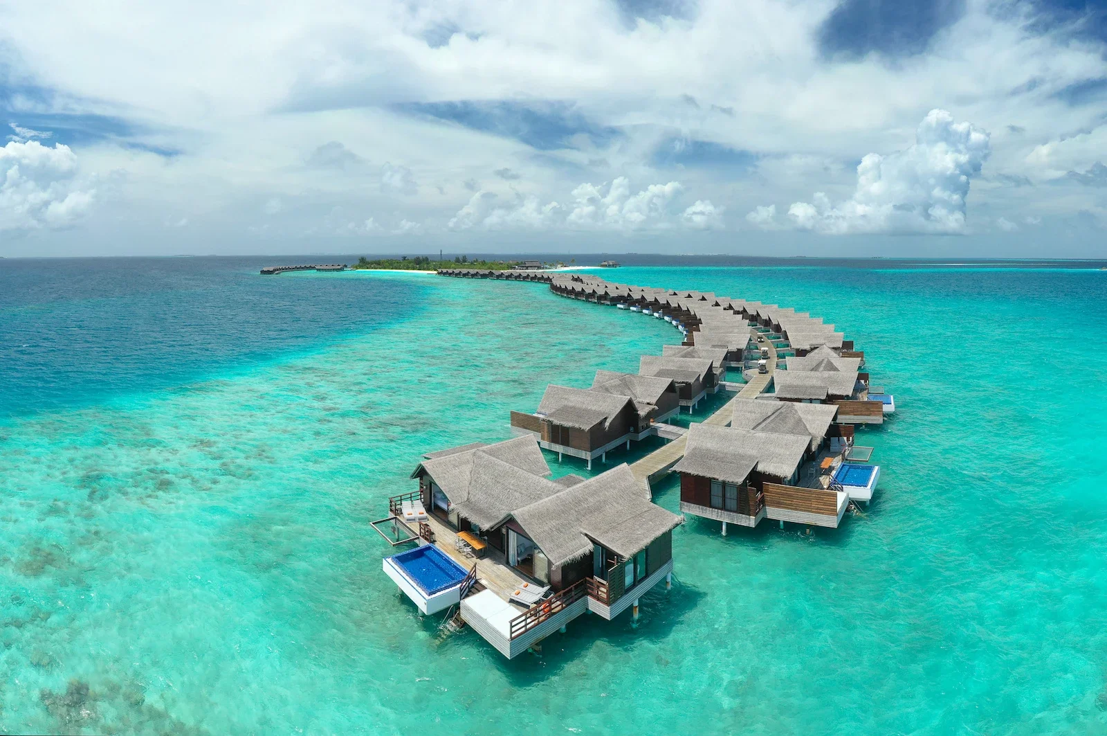 Aerial view of the Grand Residences over the lagoon, Grand Park Kodhipparu