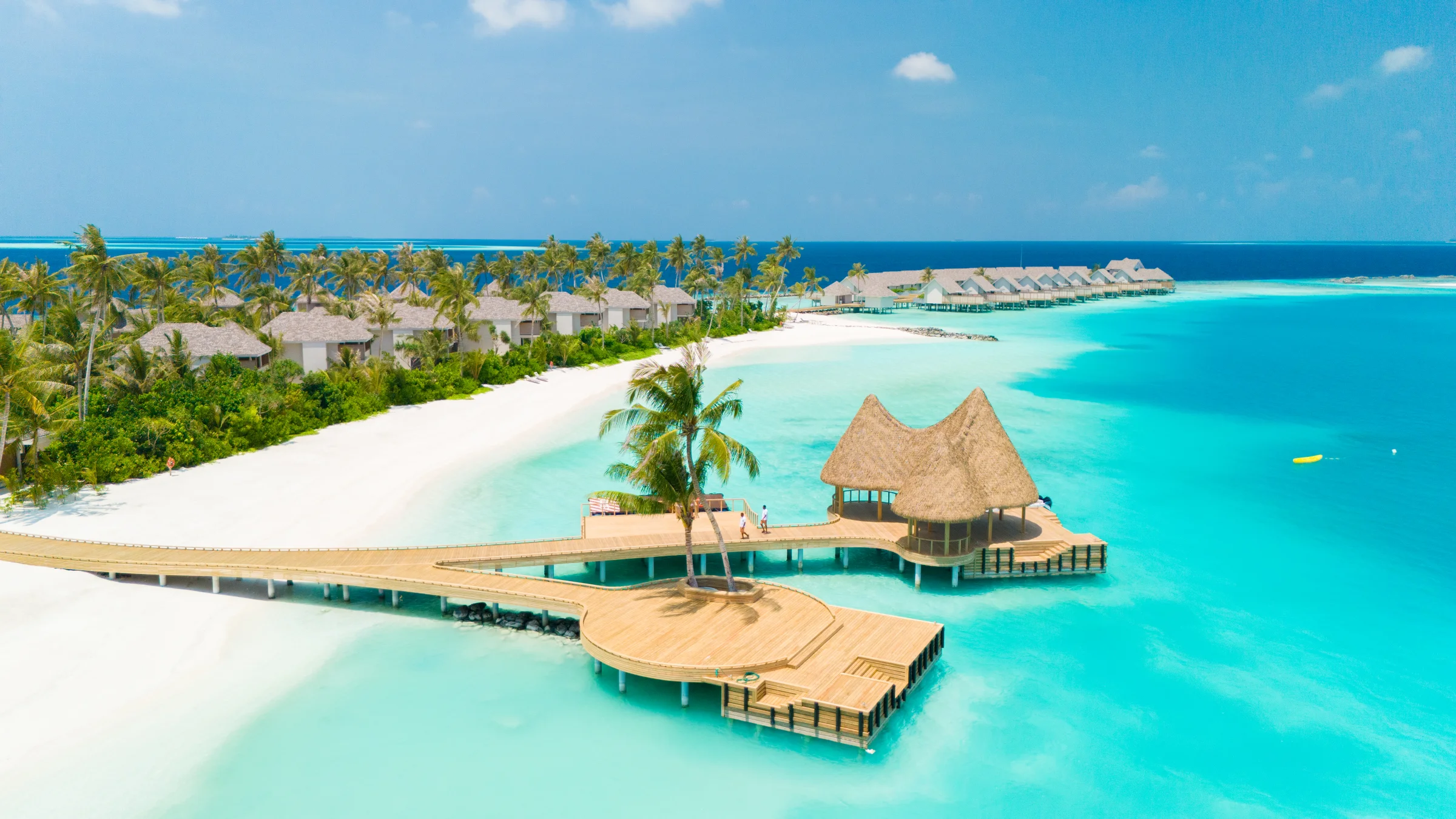 Aerial view of the beach, jetty and water villas, Ananea Madivaru Maldives