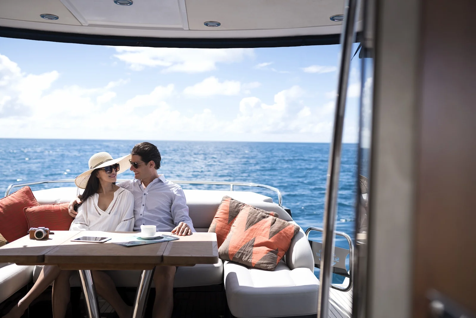 Couple having breakfast on a yacht, Anantara Dhigu