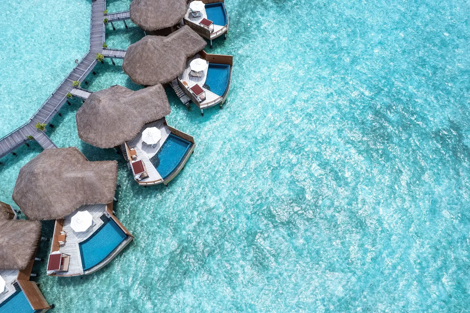 Aerial view of the water villas and their plunge pools, Baros Maldives