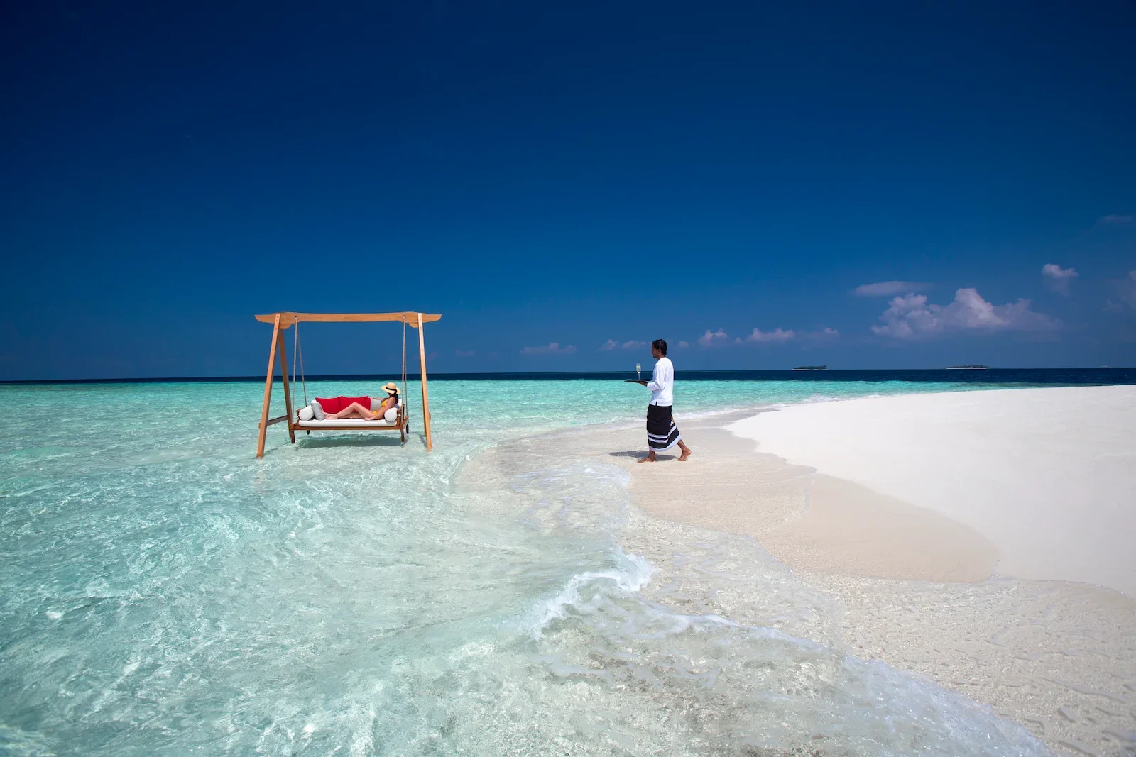 Beach swing on a sandbank, Baros Maldives