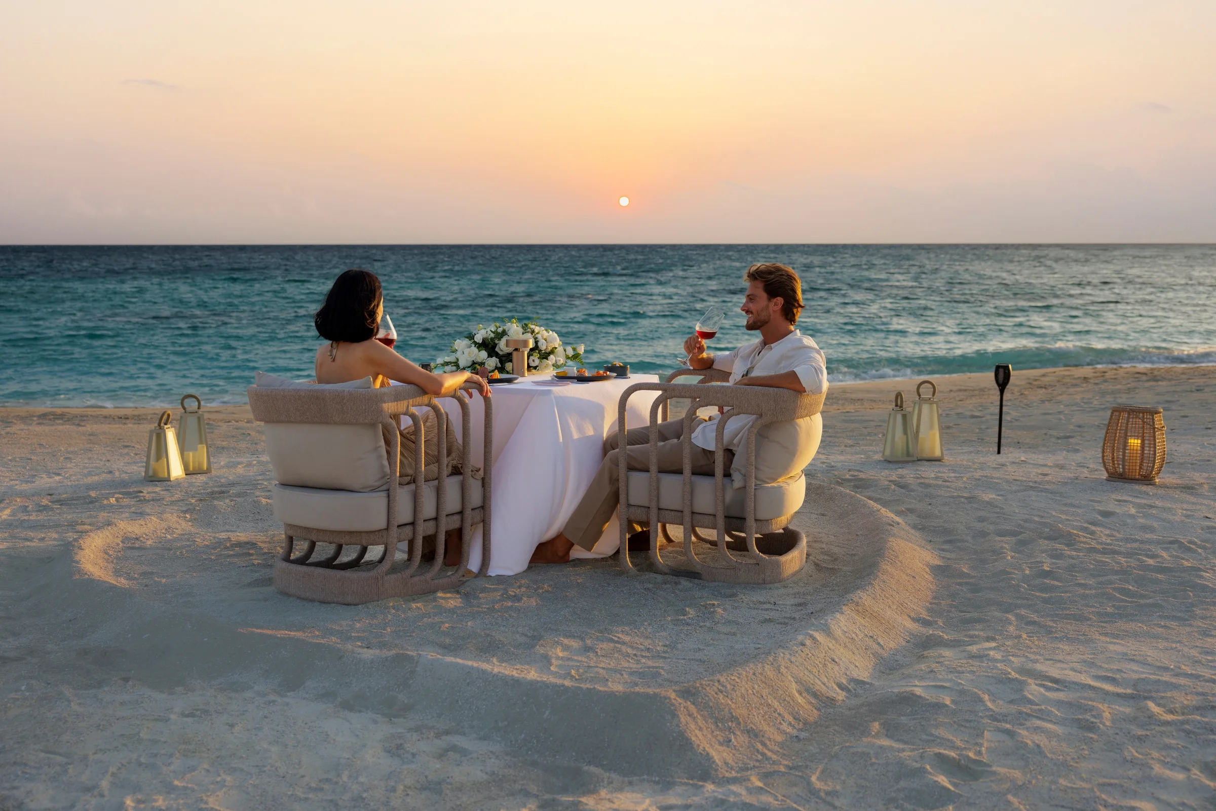 Private dinner on the beach at sunset, Centara Grand Lagoon Maldives