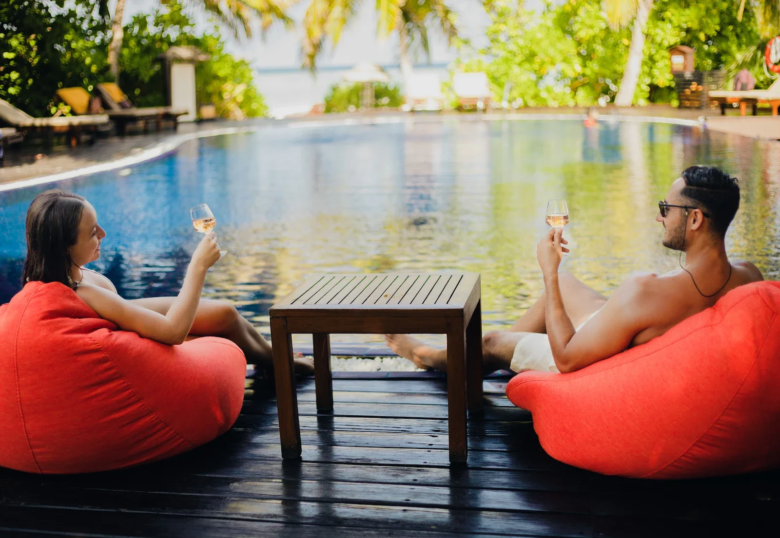 Couple relaxing by the pool, Adaaran Prestige Vadoo