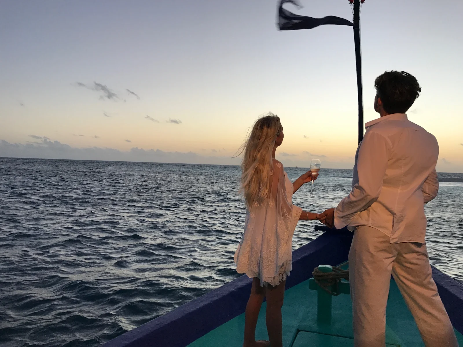 Couple on a sunset cruise, Grand Park Kodhipparu