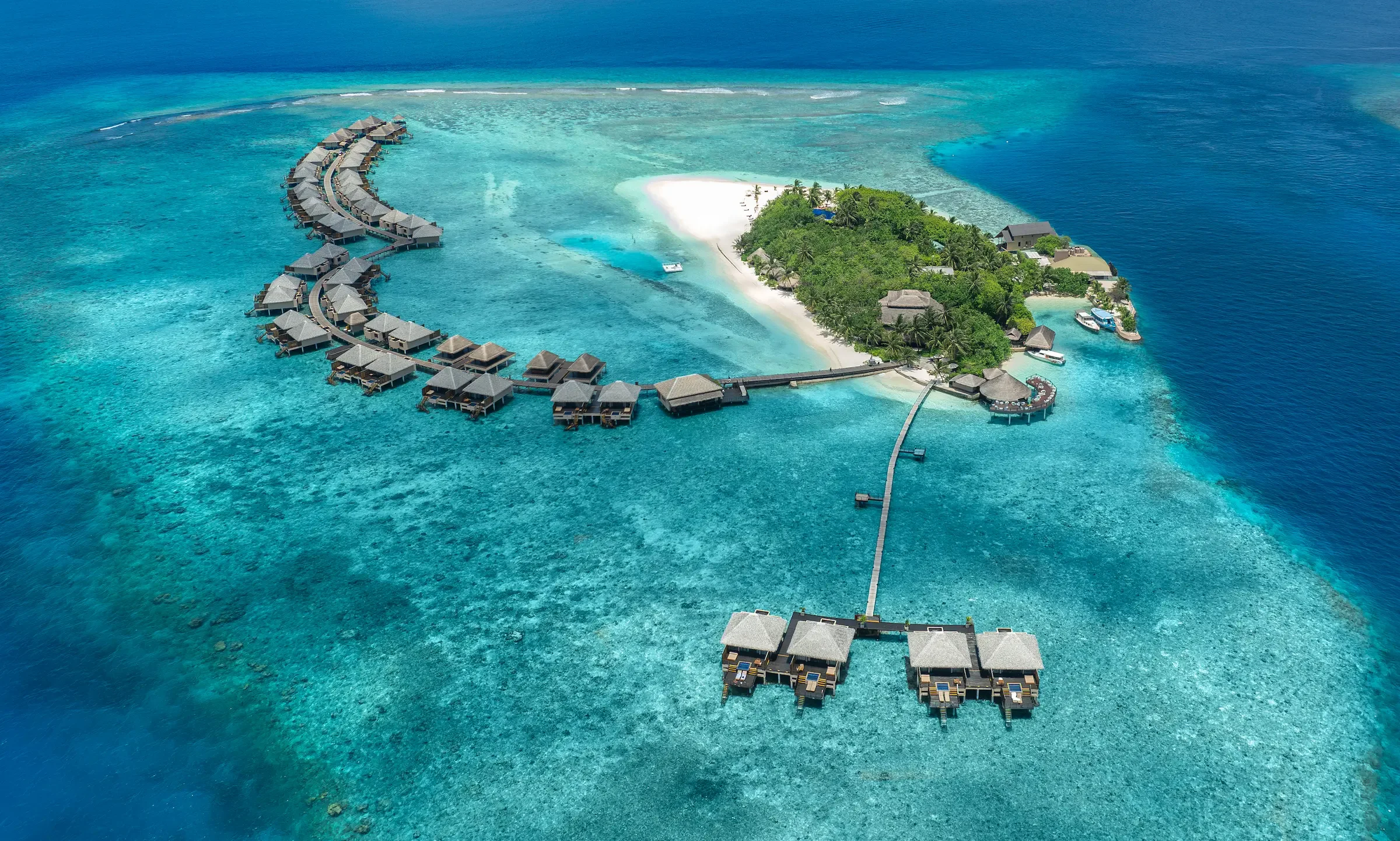 Aerial view of the island and its water villas, Adaaran Prestige Vadoo