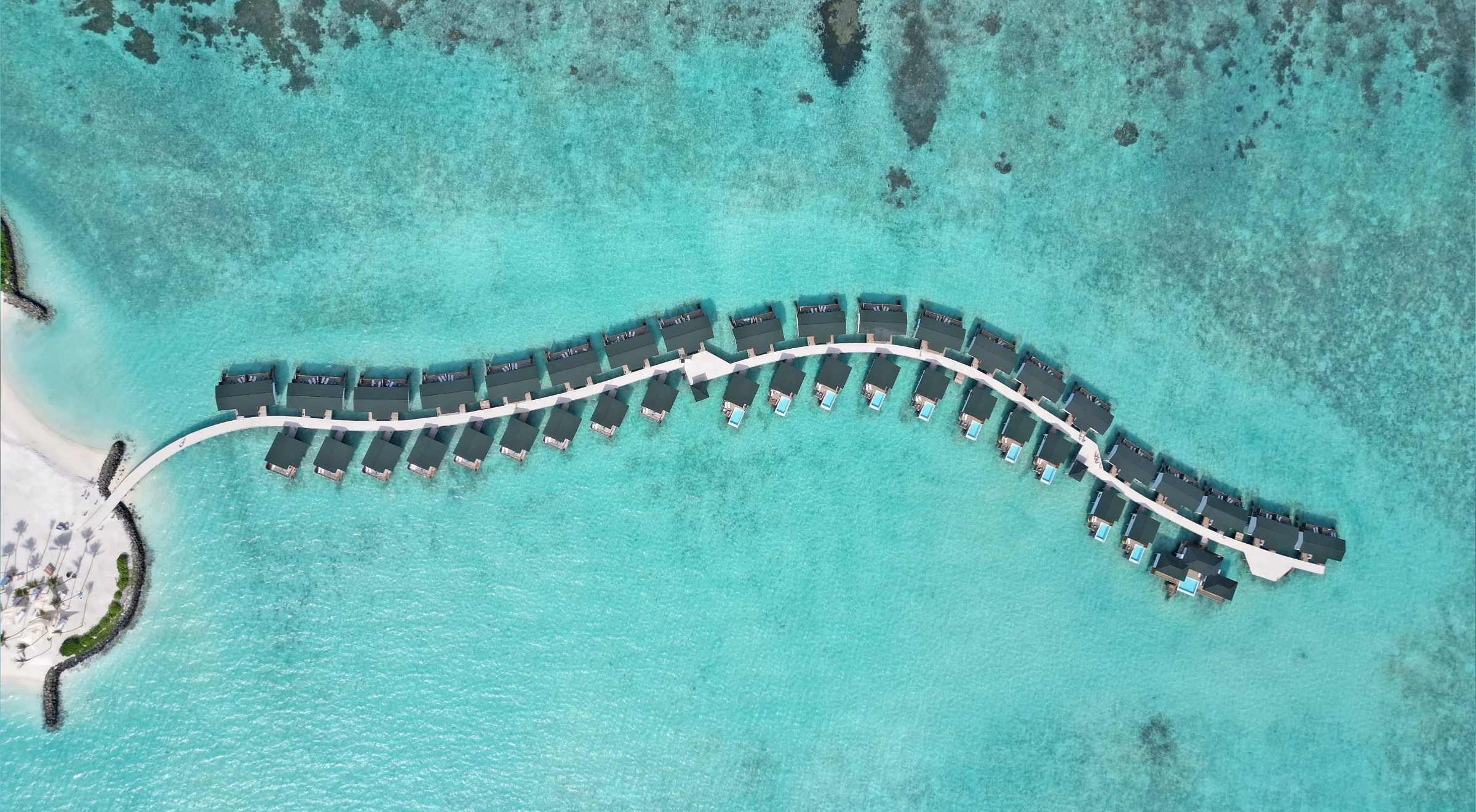 Aerial view of the overwater villas, Joy Island by Cocoon