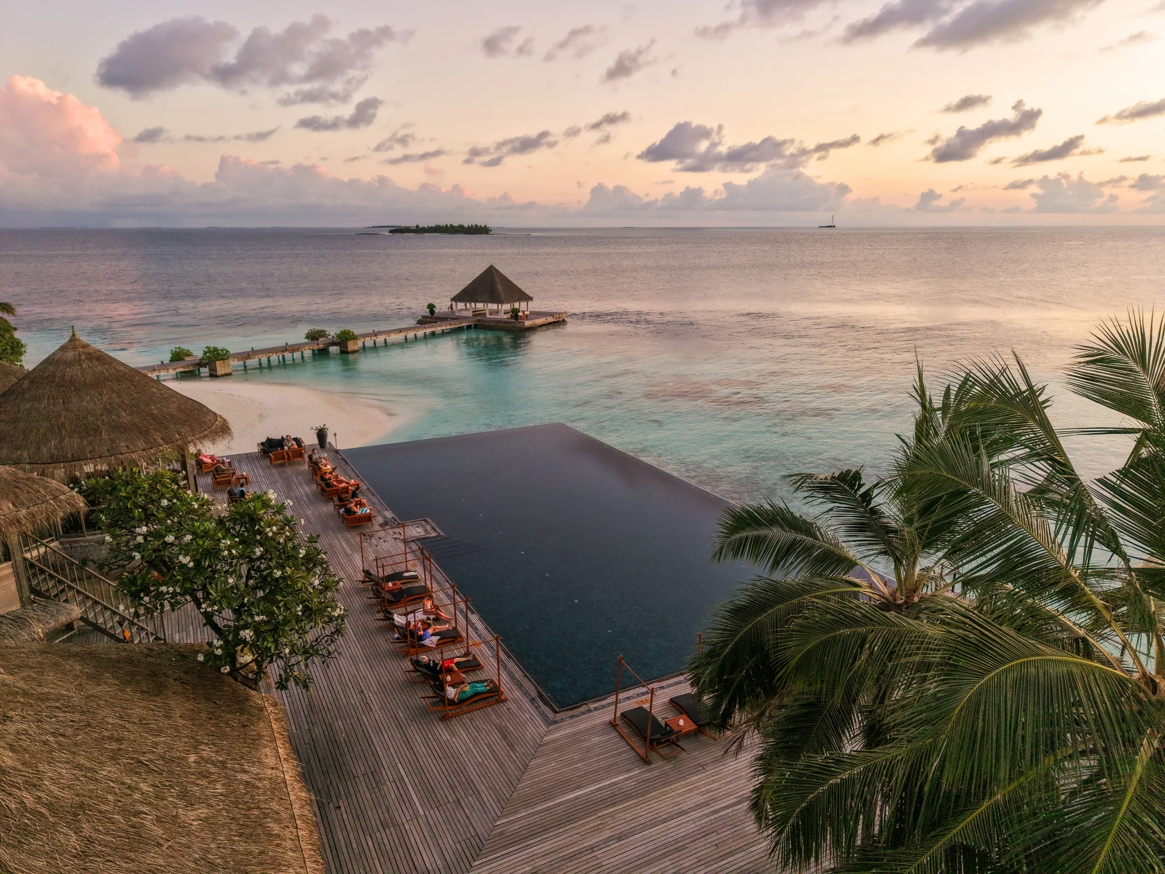Latitude infinity pool at sunset, Coco Bodu Hithi