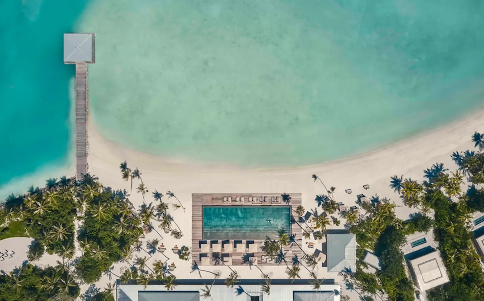 Aerial view of the main pool and beach, Patina Maldives Fari Islands