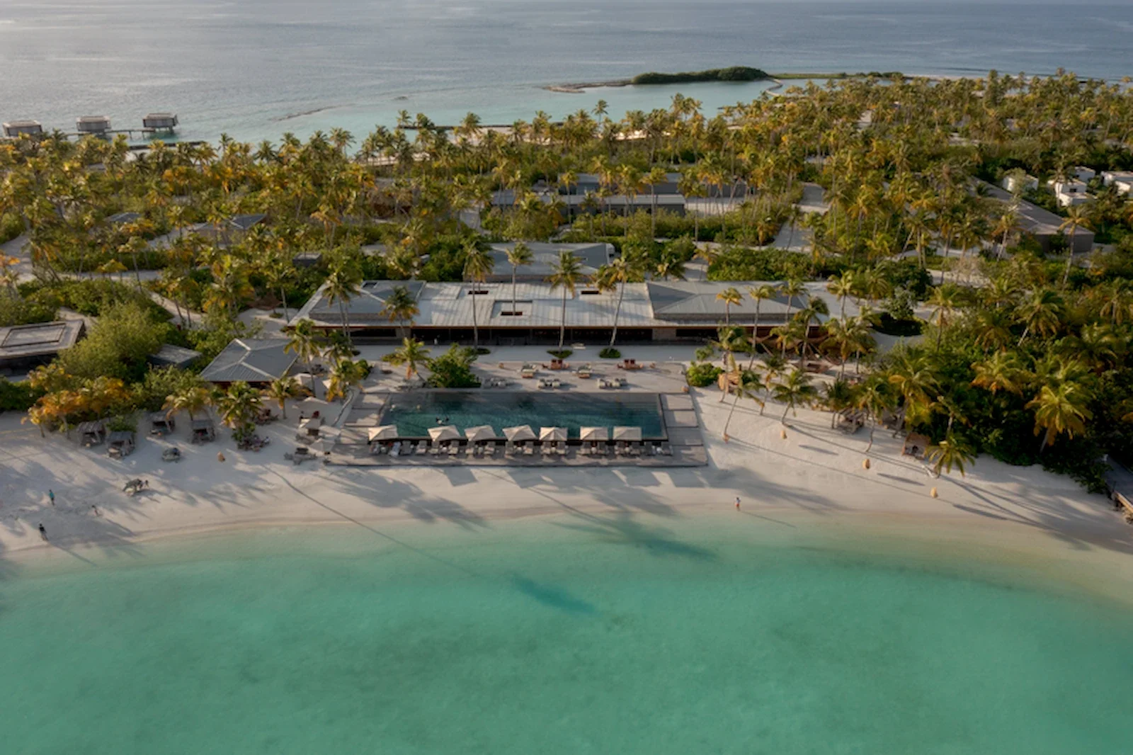 Aerial view of the beachfront and island, Patina Maldives Fari Islands