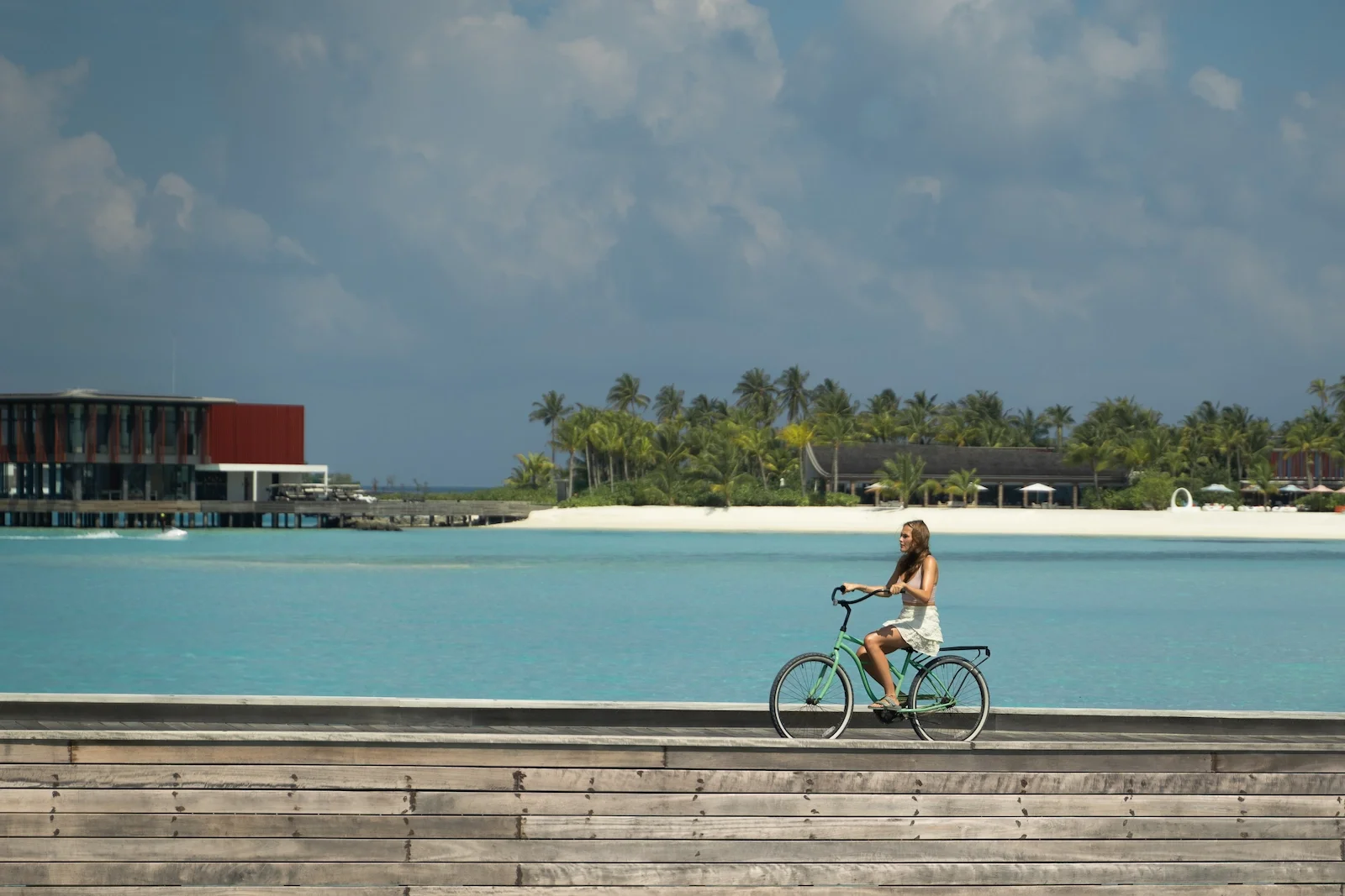 Cycling along the boardwalk, SO/ Maldives