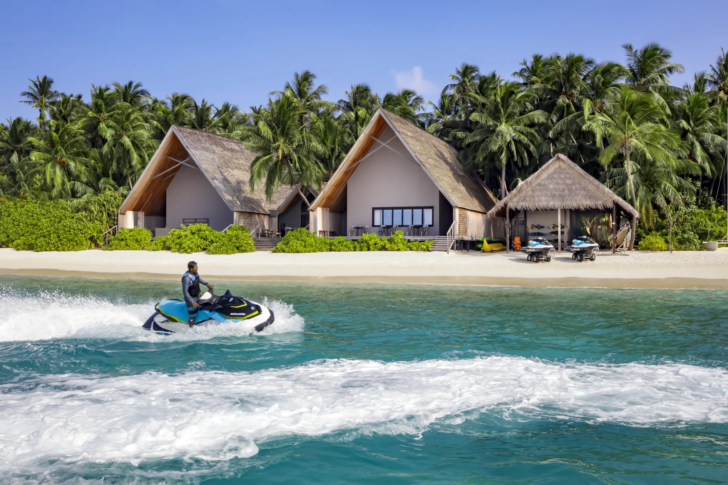 Jet ski in front of the beach villas, The St Regis Maldives Vommuli