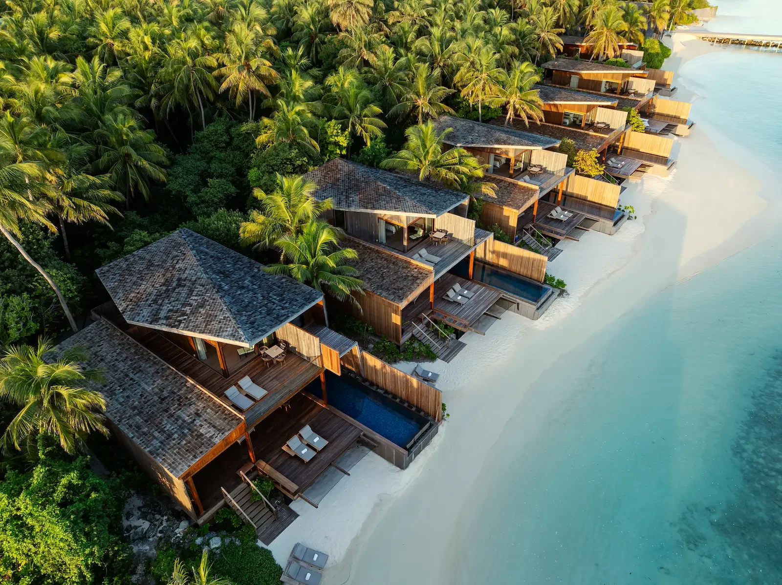 Aerial view of the beach villas and their pools, The St Regis Maldives Vommuli