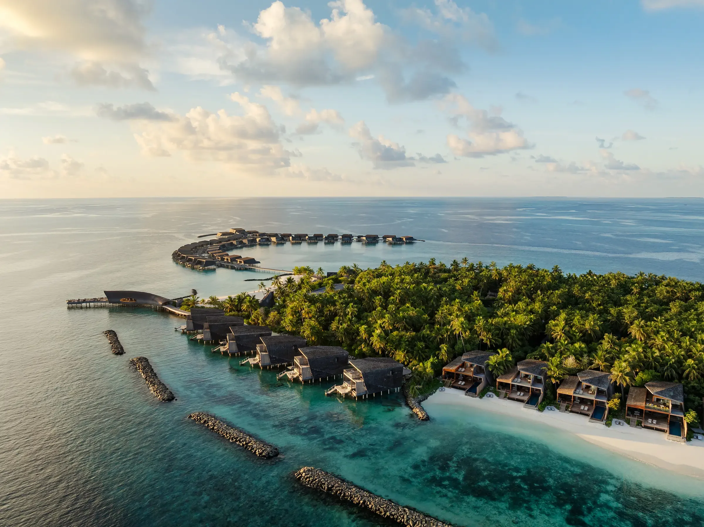 Aerial view of the island and its water villas, The St Regis Maldives Vommuli