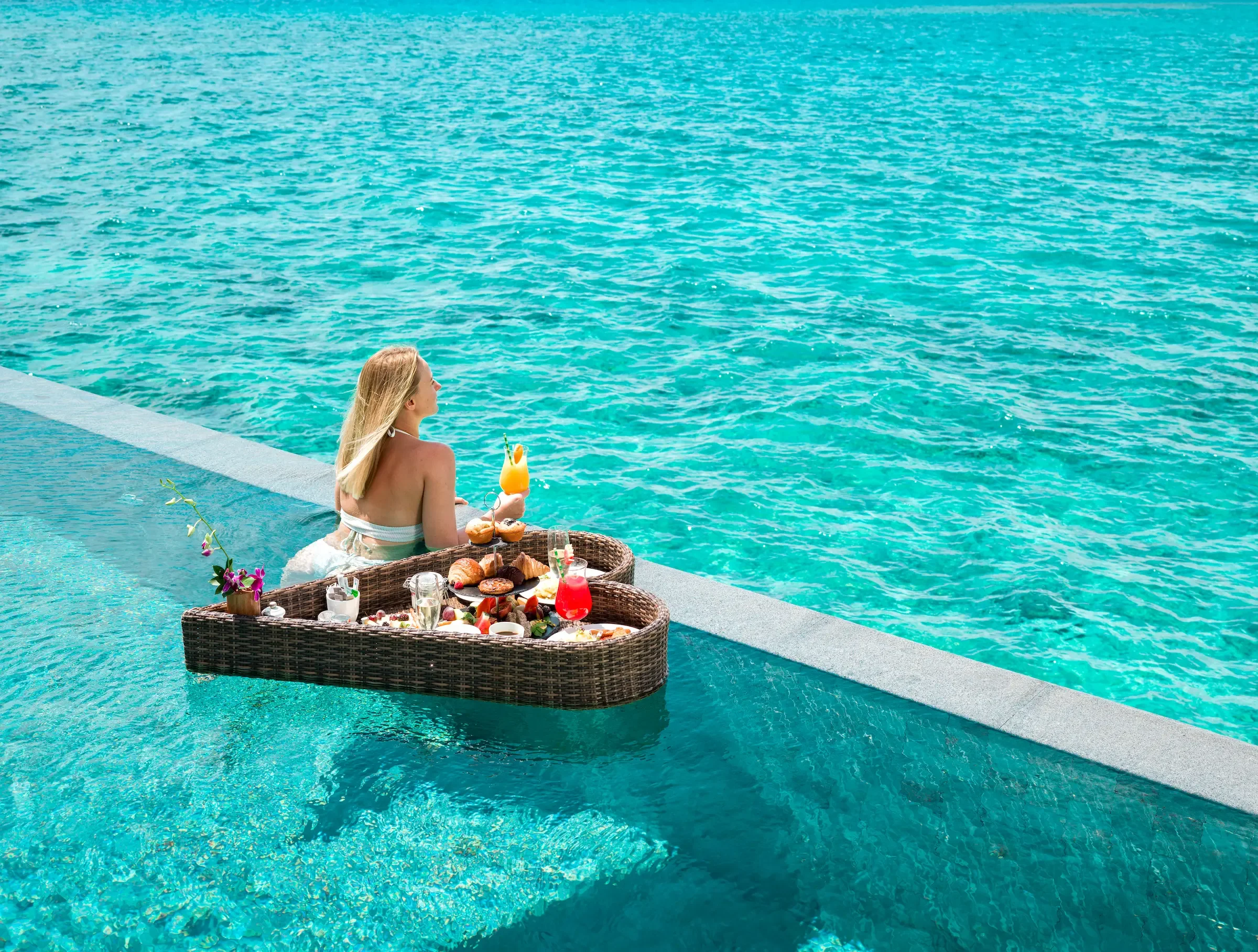Floating breakfast in an infinity pool, Vakkaru Maldives